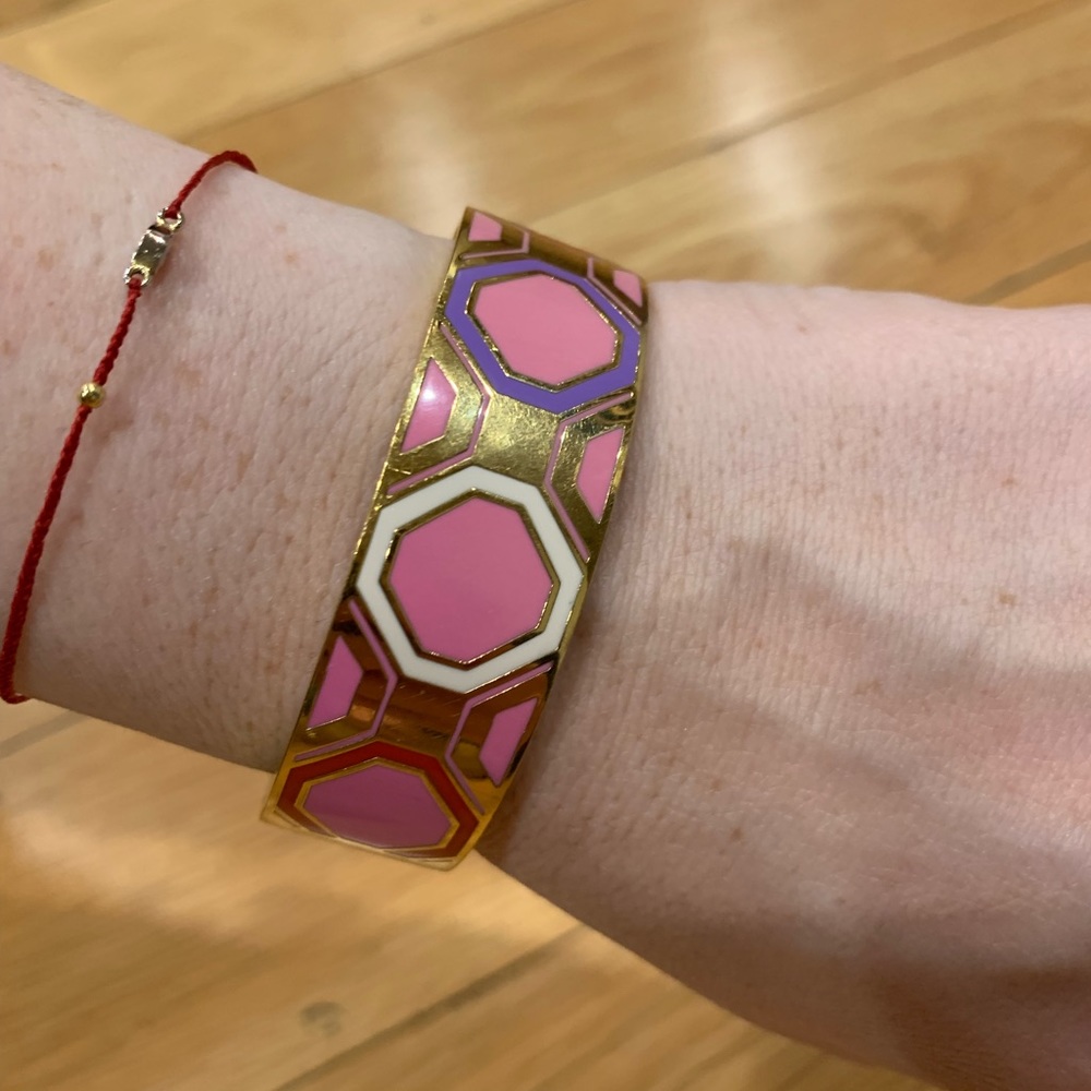 Gold and enamel Kate Spade bangle